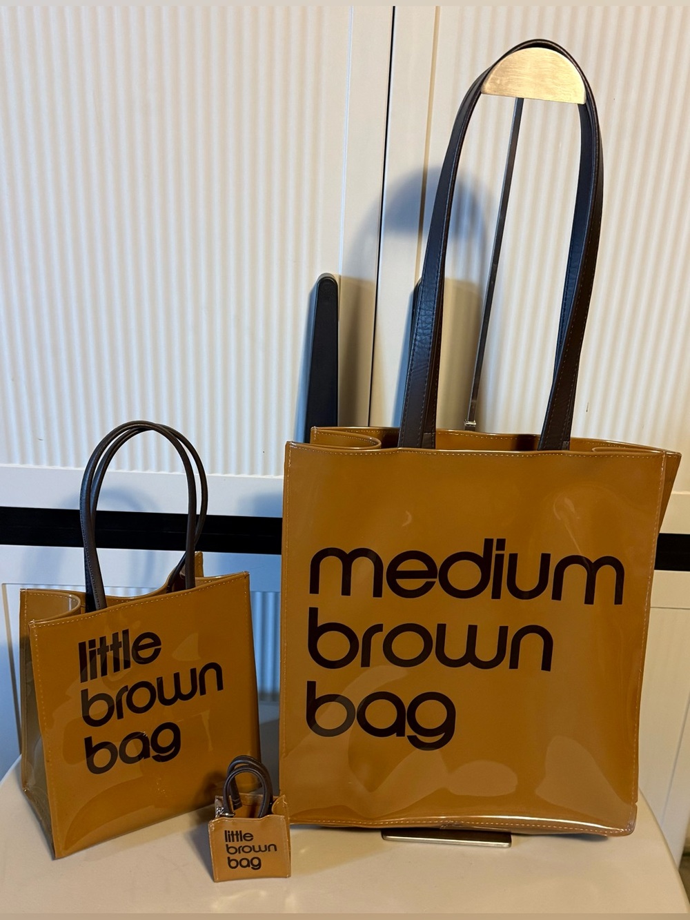 Bloomingdale’s Exclusive Medium and Little Brown Bag with Key Chain Logo Detail